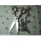 Collana con ciondolo a forbice