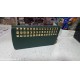 portafoglio donna verde con borchie in ecopelle 