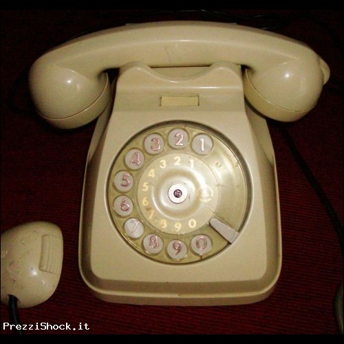 telefono vintage con numeratore a disco