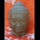 Testa del Buddha in conglomerato decorato anticato